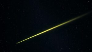 Bright Taurid fireball meteor streaking across the night sky with stars in background - celestial events this week