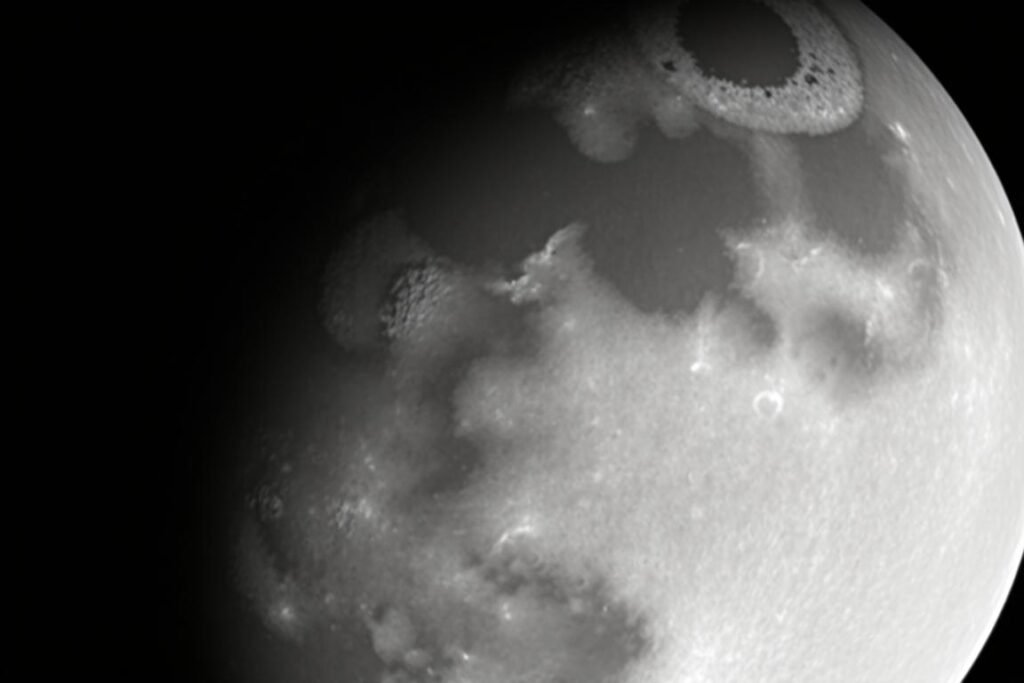 Full moon photographed with telephoto lens showing detailed surface features during celestial events this week